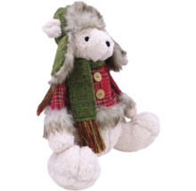 Dekorativ plyschfigur av ett sittande lamm med mössa och halsduk