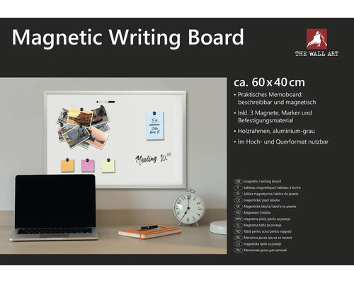 Magnetisk skrivtavla cirka 60 x 40 centimeter med träram och tillbehör på ett skrivbord