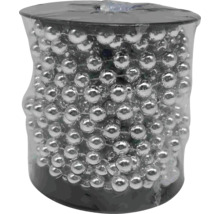 Girlang med silverfärgade kulor i förpackning