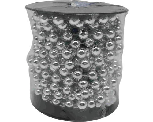 Girlang med silverfärgade kulor i förpackning