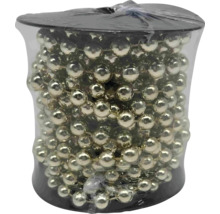 Dekorationskedja med pärlor i plastbehållare