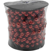 Rulle med glänsande, röd pärlkedja för dekoration