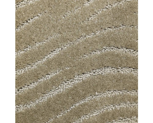 Närbild av en beige matta med mönster