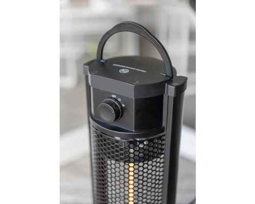 Svart värmare med handtag och vridknapp