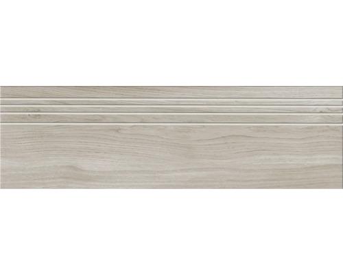 Keramisk platta med träutseende och spårstruktur