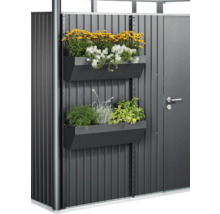 Trädgårdsskåp med blomlådor och plantering