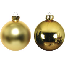 Två gyllene julgranskulor att hänga upp