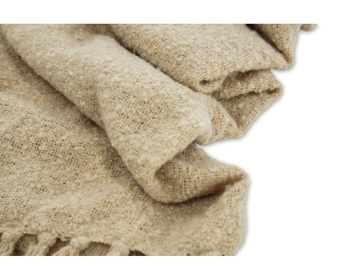 Beige överkast med fransar