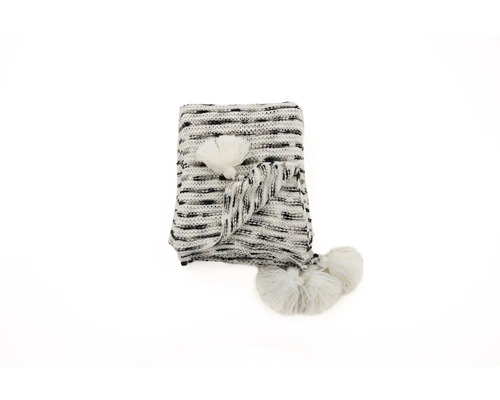 Vikt stickad filt med tofsar