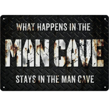 Dekorativ metallskylt med texten: Det som händer i man cave stannar i man cave.