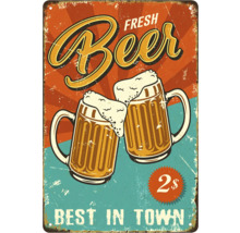 Dekorativ plåtskylt med ölmotiv i retrostil