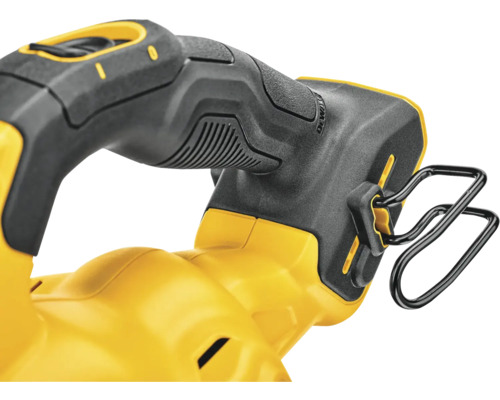 Detaljbild av en gul sticksåg med svart handtag