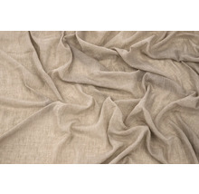 Närbild av beige linnetyg med veck