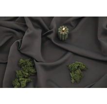 Dekorativt klotljus och mossa på tyg