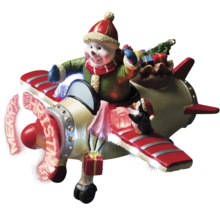 Juldekoration med snögubbe i flygplansdesign