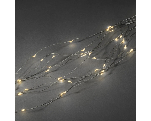 Ljusslinga KONSTSMIDE 90 bärnstensfärgade dioder droppe 10 strängar 0,9m silver LED-ljusslinga med fina trådar och varmvitt ljus