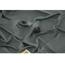 Dekorativt blockljus med rök på tyg