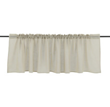 Gardin med rynkbandsupphängning på en gardinstång