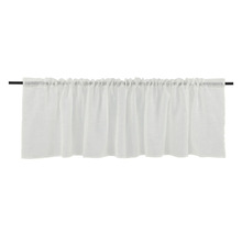 Gardin med rynkbandsupphängning på en gardinstång