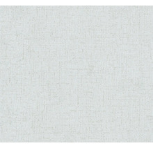 Närbild av en ljus textil tapet med fin struktur