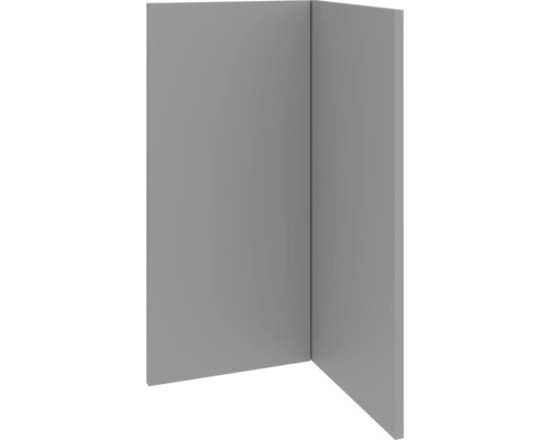 Hörnvy av en grå väggbeklädnad som visar en modern rumsdesign.