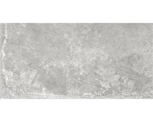 Grå golvplatta med betonglook