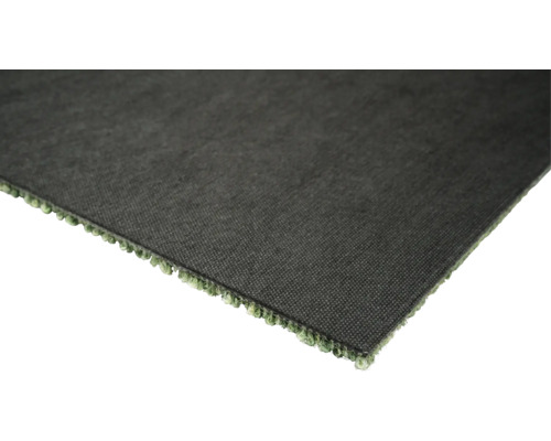 Närbild av en bit konstgräs.