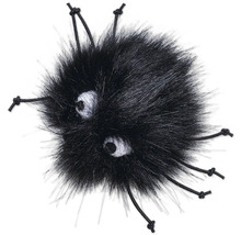 Svart lurvigt leksak med ögon och snören