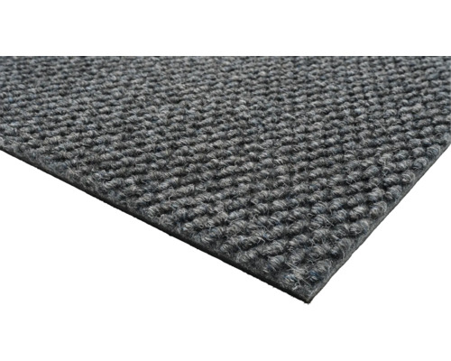 Detaljvy av en grå matta.