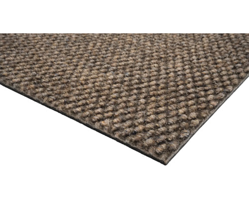 Detaljvy av en dörrmatta av textilmaterial