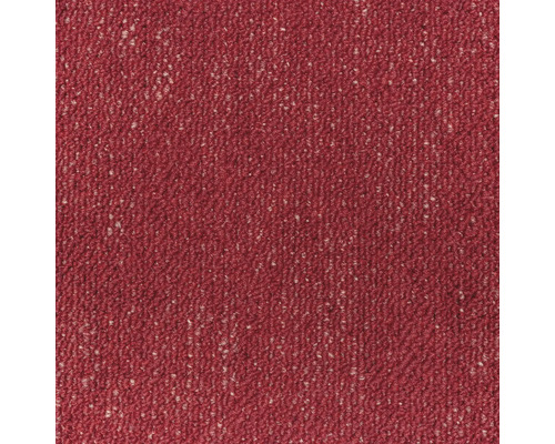 Närbild av en röd matta med melerad effekt