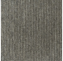 Detaljvy av en ribbad matta.