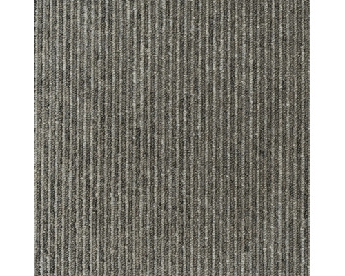 Detaljvy av en ribbad matta.