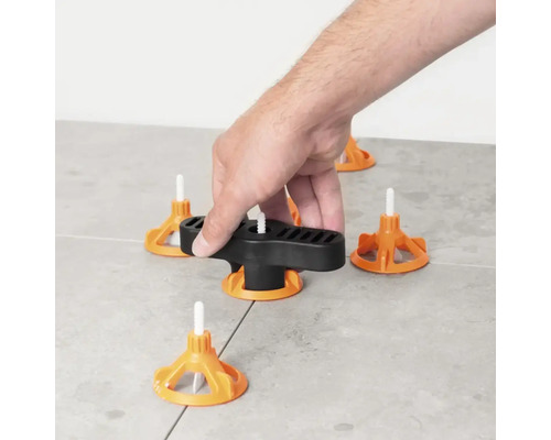 Kakel nivelleringssystem med hand