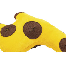 Närbild av ett gult giraffhuvud gosedjur med bruna fläckar