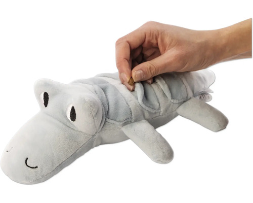 Grå krokodilplyschleksak fylld med en godbit