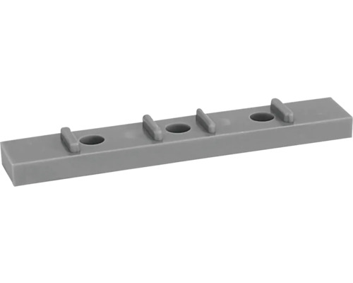 Grått plastclips med hål och fästen för olika applikationer