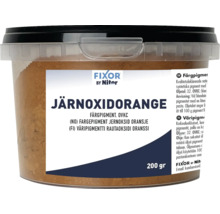 Järnoxidorange färgpigment i en genomskinlig behållare