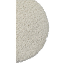 Detaljbild av en rund, texturerad sittdyna