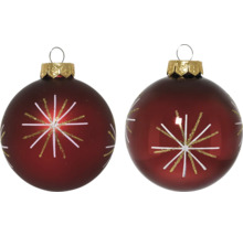 Två julgranskulor med stjärnmönster