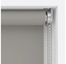 Detaljvy av en rullgardin med kedjemekanism för fönsterdekoration