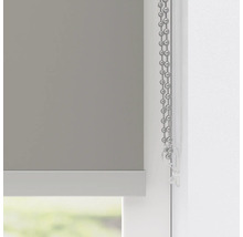 Närbild av en rullgardin med kedjedrag