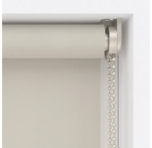 Detaljbild av en rullgardin med kedjedrag