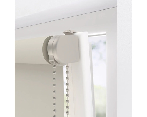 Rullgardiner med kedjedragning på en fönsterkarm