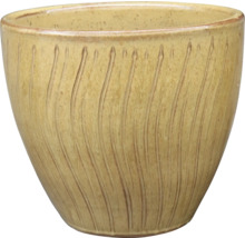 Blomkruka i keramik med vertikalt spårmönster