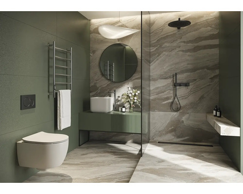 Modernt badrum med dusch, handfat, spegel och toalett.