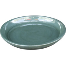 Växtunderlägg av keramik