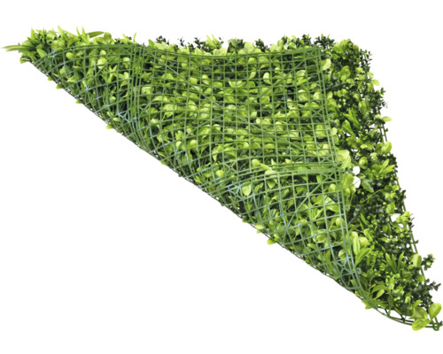 Konstgräsmatta med växter på plastgaller