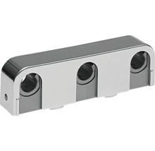 Metallrörklämma med tre öppningar för fastsättning av rör