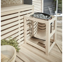 Bastu med kamin, bastustenar och träaccessoarer